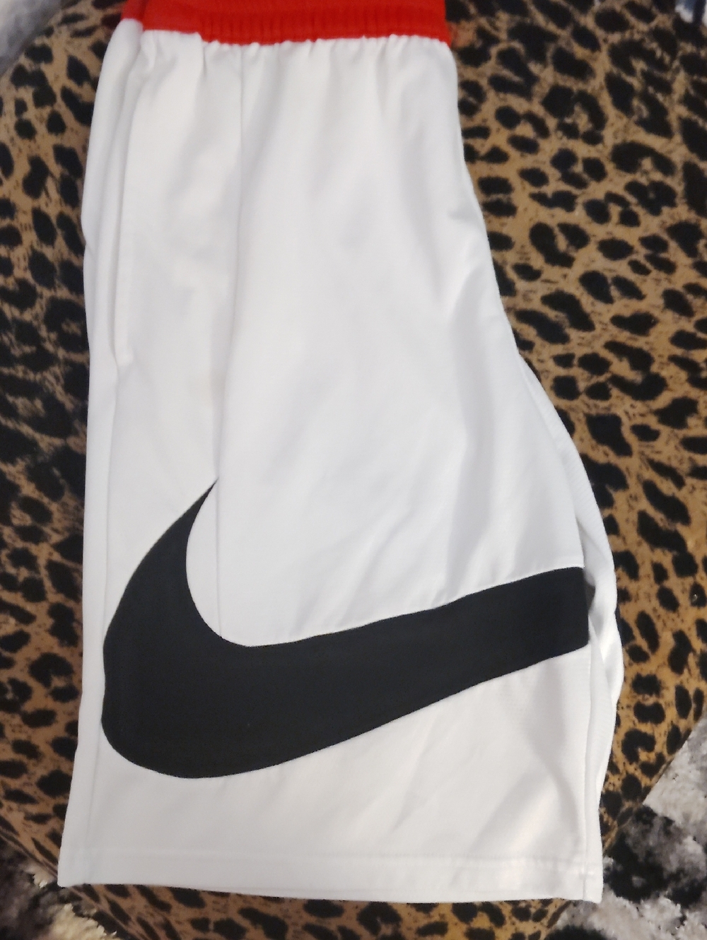 Nike White Shorts with Black Swoosh and Red Waistband